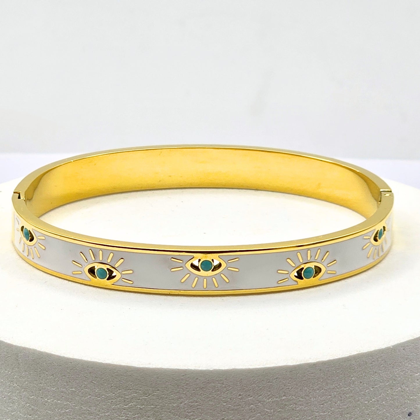 White enamel gold-plated evil eye bangle for everyday wear, tarnish-free and elegant