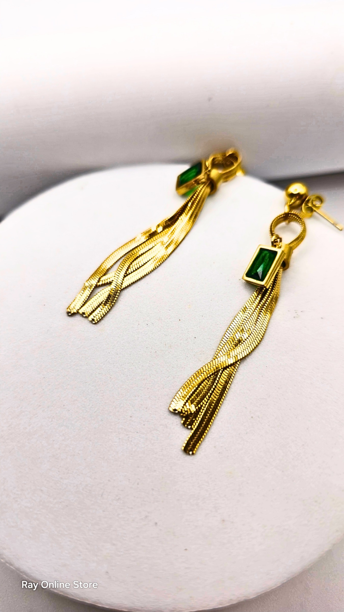 Mid length earrings made of stainless steel with dangling green crystal. Earrings are made of 316L Stainless Steel and are waterproof.