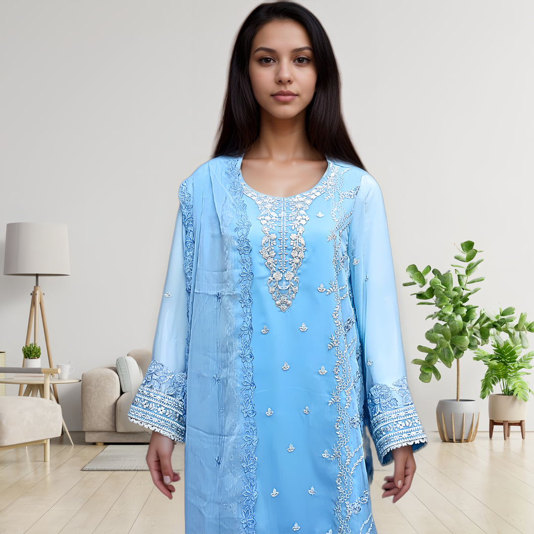 The Serene Blue Chiffon Embroidered Suit-3 PC is a must-have. Elevate your style with delicate embroidery on soft chiffon dupatta and shirt. Silk pants feature exquisite organza details for a chic and comfortable ensemble.