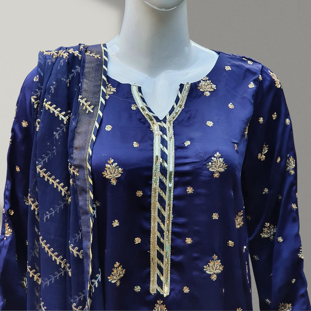 Stylish and luxurious, the Blue Tilla Suit-3PC is perfect for celebratory events. Made from satin fabric with tilla embroidery and sequins, it features a sophisticated dupatta for added opulence