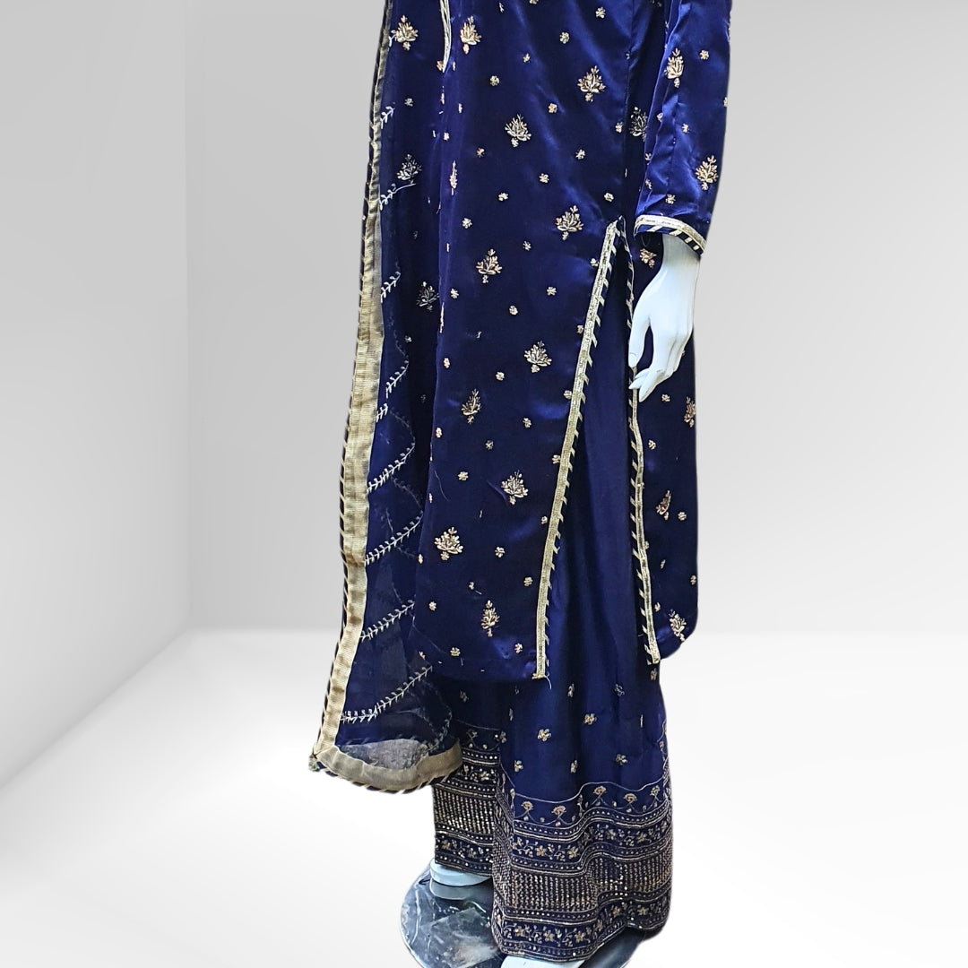 Stylish and luxurious, the Blue Tilla Suit-3PC is perfect for celebratory events. Made from satin fabric with tilla embroidery and sequins, it features a sophisticated dupatta for added opulence