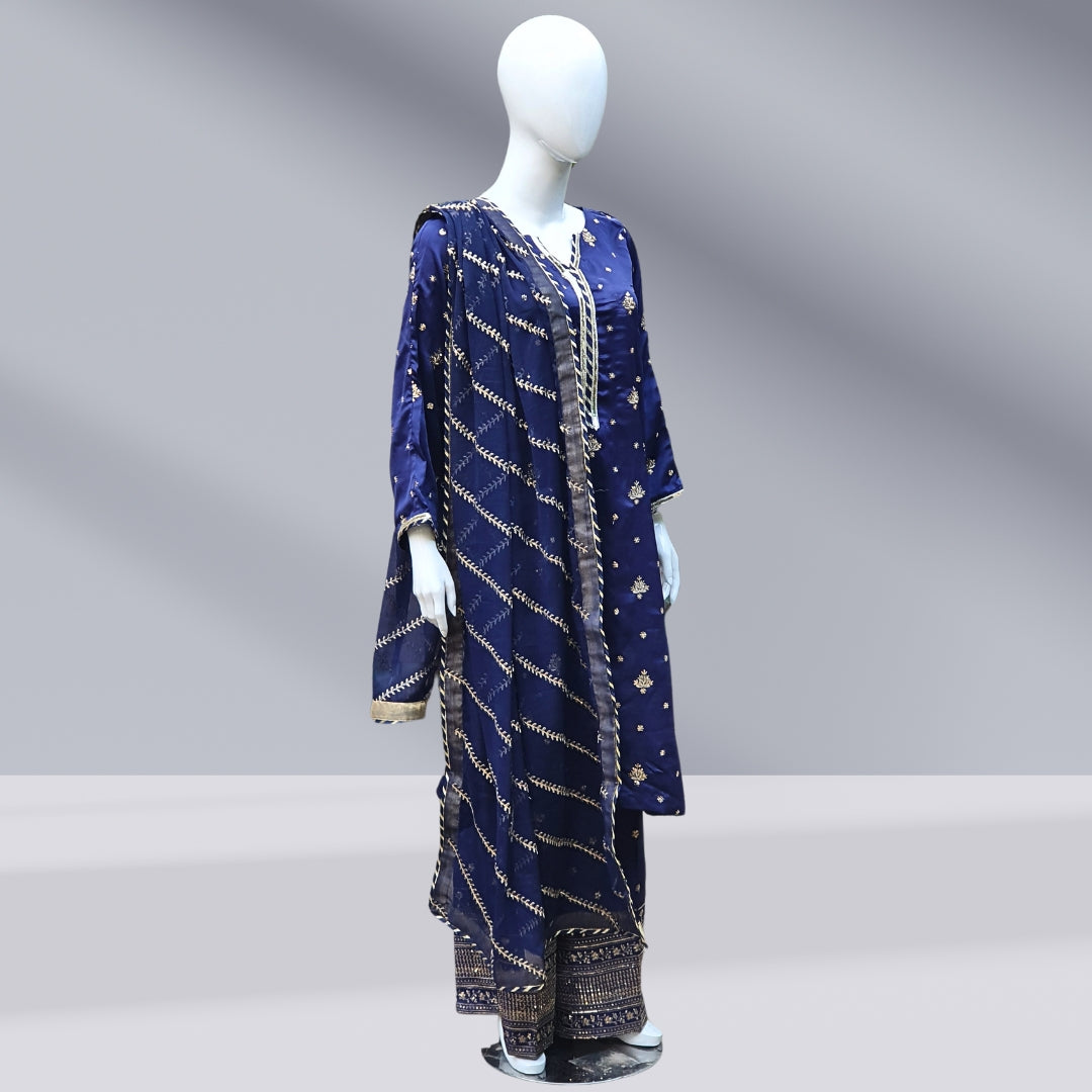 Stylish and luxurious, the Blue Tilla Suit-3PC is perfect for celebratory events. Made from satin fabric with tilla embroidery and sequins, it features a sophisticated dupatta for added opulence