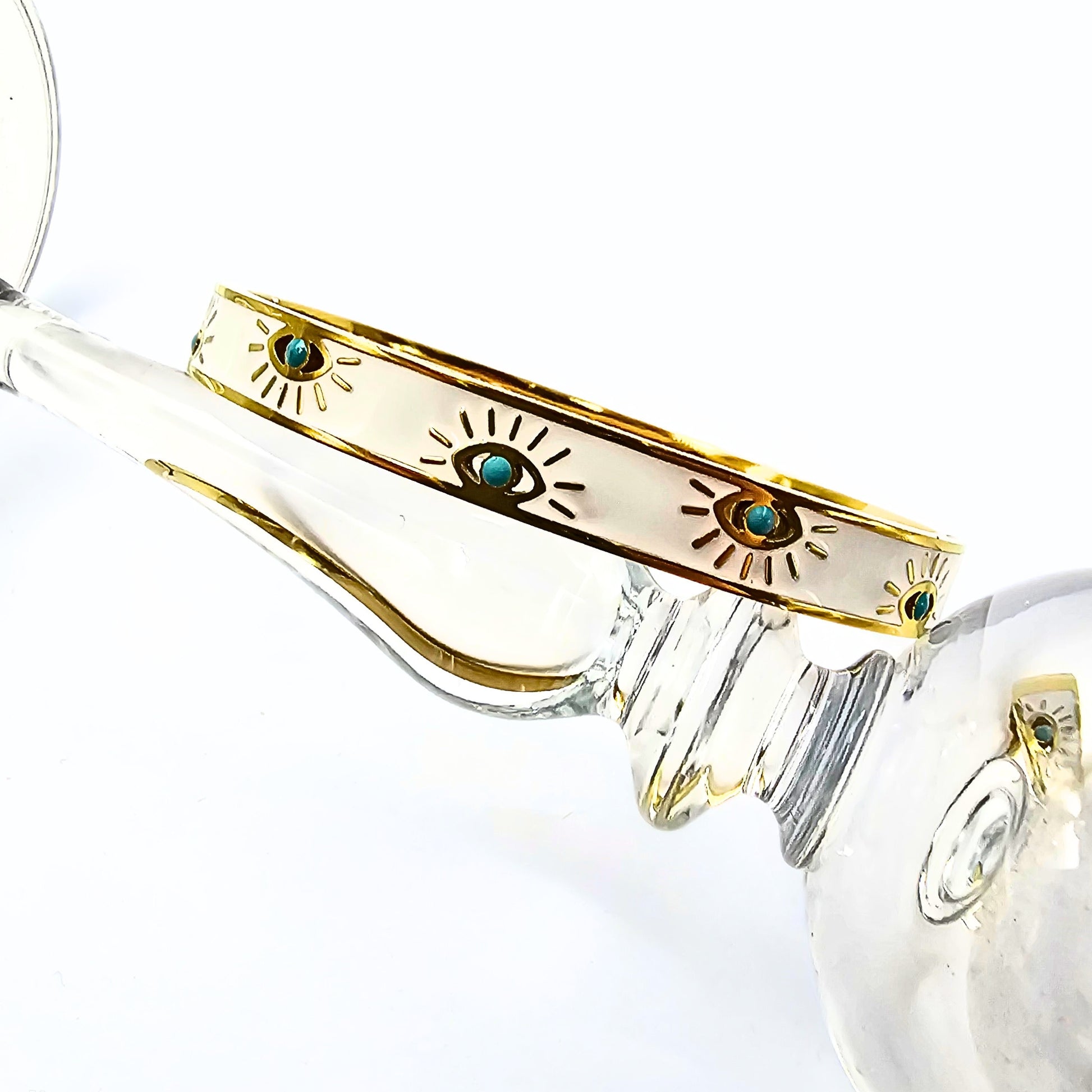 White enamel gold-plated evil eye bangle for everyday wear, tarnish-free and elegant