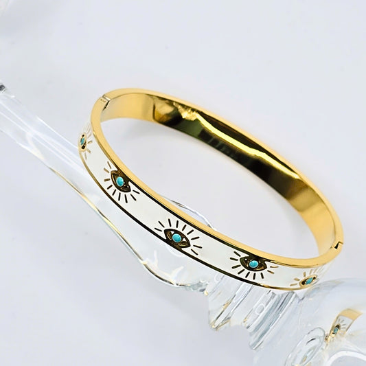 White enamel gold-plated evil eye bangle for everyday wear, tarnish-free and elegant