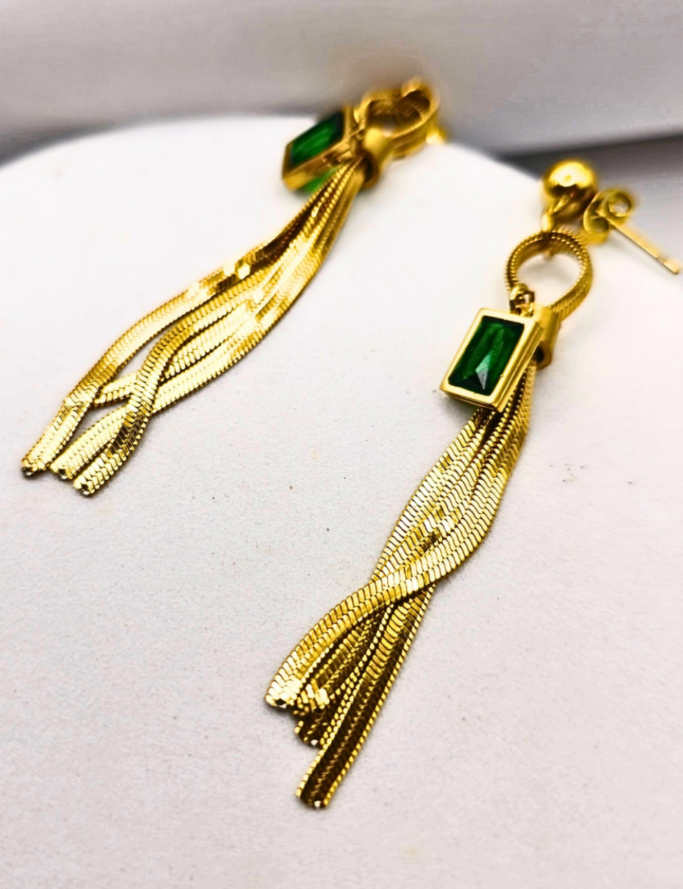 Mid length earrings made of stainless steel with dangling green crystal. Earrings are made of 316L Stainless Steel and are waterproof. 