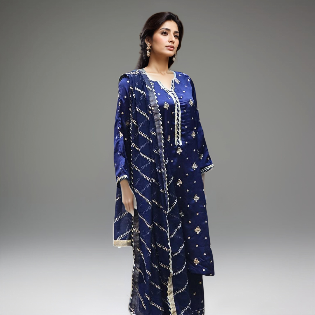 Stylish and luxurious, the Blue Tilla Suit-3PC is perfect for celebratory events. Made from satin fabric with tilla embroidery and sequins, it features a sophisticated dupatta for added opulence