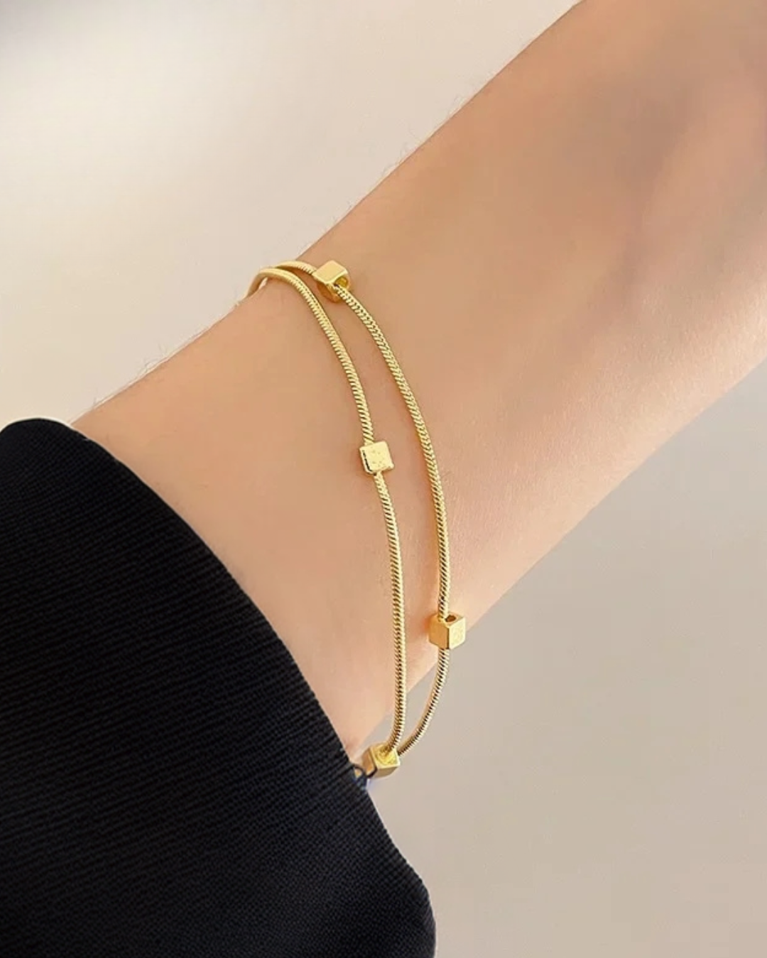 Can be mistaken for goldIntroducing the Kubic Bracelet, featuring 18K gold plating that exudes sophistication and elegance. Don't be surprised if you are mistaken for wearing real gold with this timeless piece. Upgrade your style with a touch of luxury.