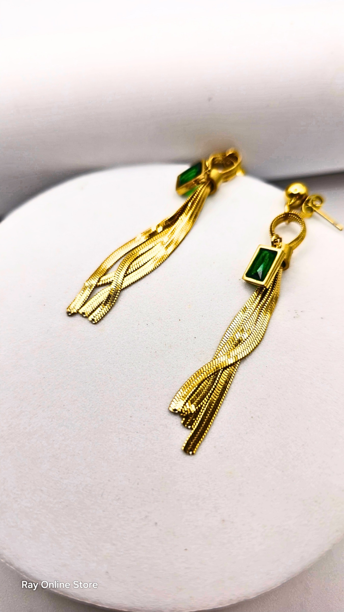 Mid length earrings made of stainless steel with dangling green crystal. Earrings are made of 316L Stainless Steel and are waterproof. 