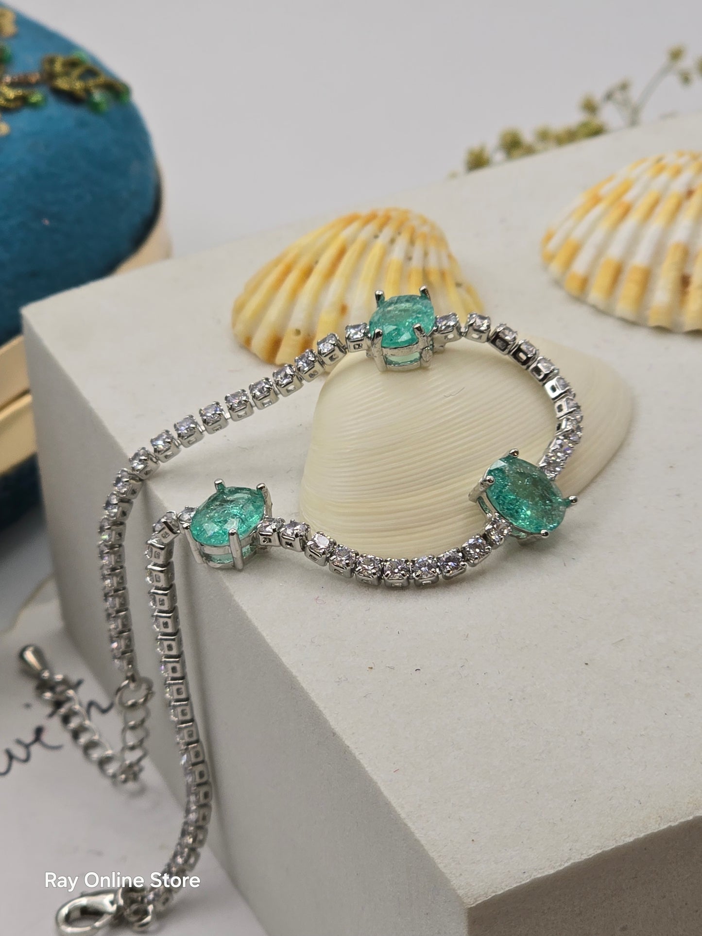 Indulge in elegance with our Mint Crystal Bracelet, featuring cool green colored stones and a sophisticated strand of crystals for a chic and eye-catching look. The high quality luster of this bracelet will add a touch of luxury to any outfit.