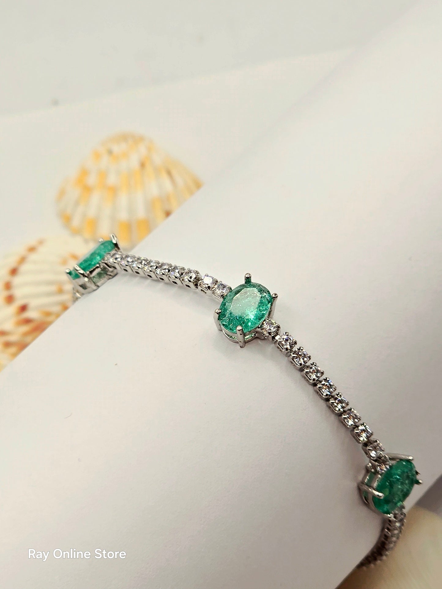 Indulge in elegance with our Mint Crystal Bracelet, featuring cool green colored stones and a sophisticated strand of crystals for a chic and eye-catching look. The high quality luster of this bracelet will add a touch of luxury to any outfit.