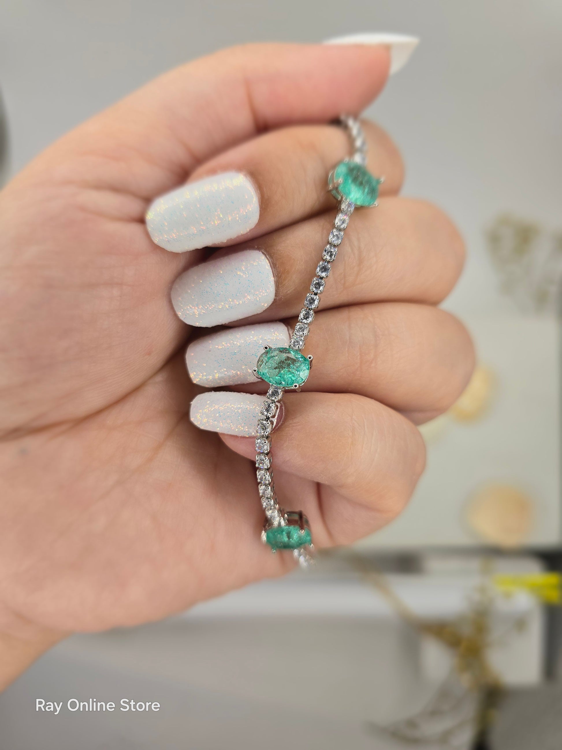 Indulge in elegance with our Mint Crystal Bracelet, featuring cool green colored stones and a sophisticated strand of crystals for a chic and eye-catching look. The high quality luster of this bracelet will add a touch of luxury to any outfit.